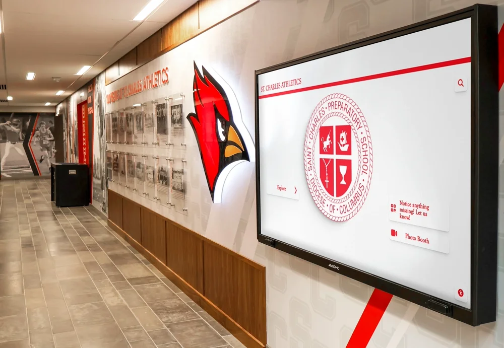 St. Charles Preparatory School recognition display beside physical Hall of Fame plaques