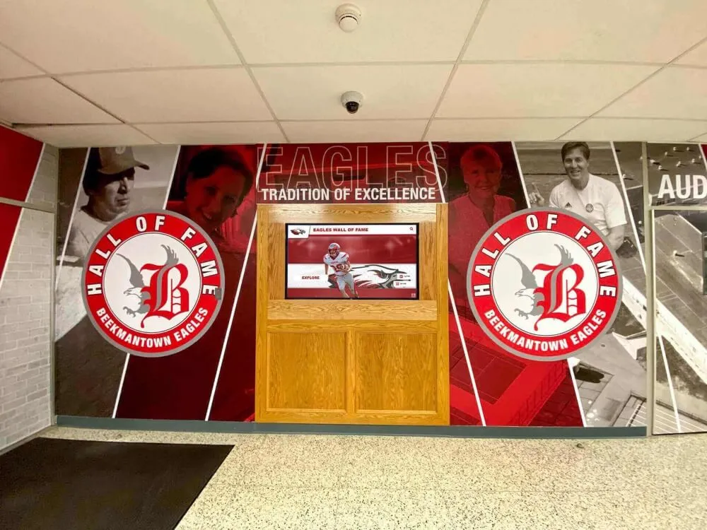 Hall of fame display integrated with campus branding Digital recognition in campus environment