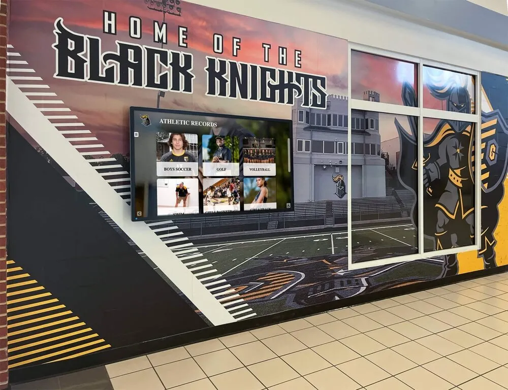 School hallway with athletic records display