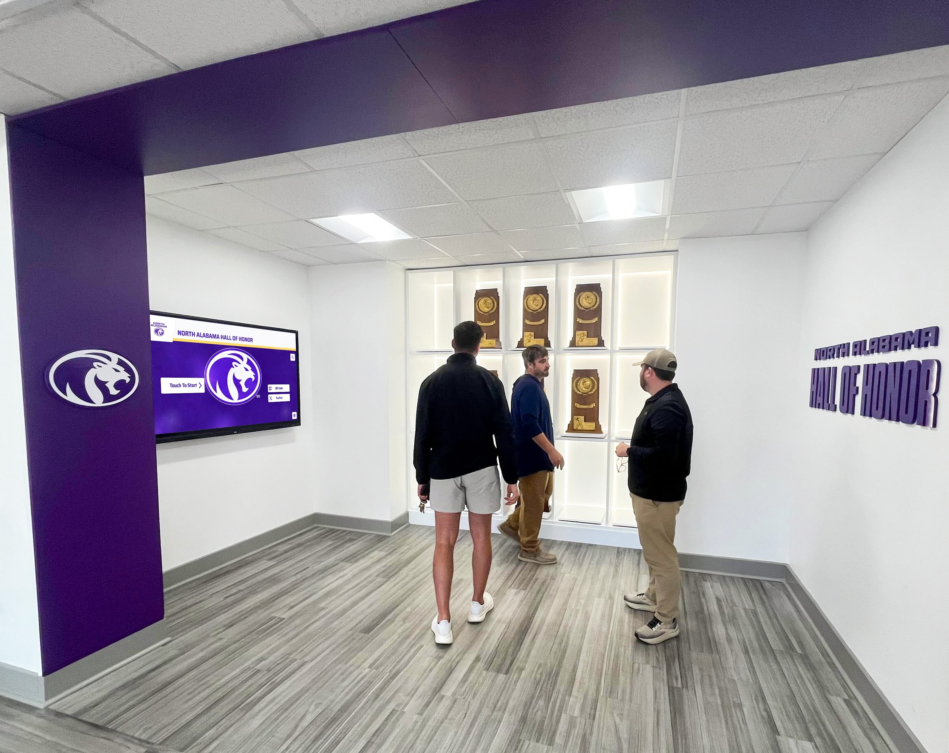 Athletic recognition wall with digital displays